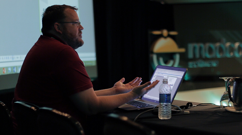 Photo of Paul Pehrson presenting at MadWorld 2014